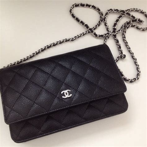 black chanel logo wallet|Chanel black wallet with chain.